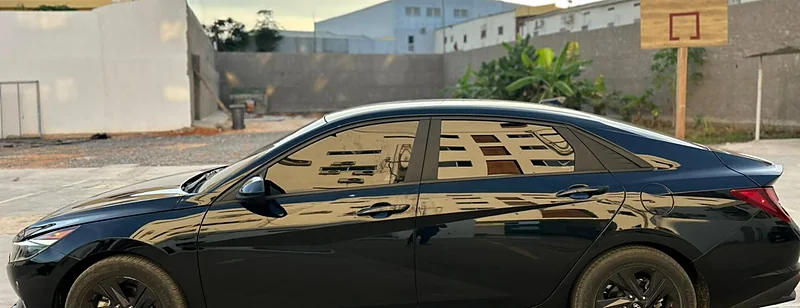 Black Hyundai Elantra from Costa Phoebe's own fleet, in Luanda