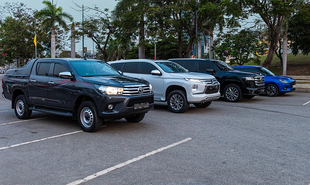 Mitsubishi Pajero Sport, Toyota Land Cruiser 300 and Suzuki Swift from the Costa Phoebe fleet in Luanda